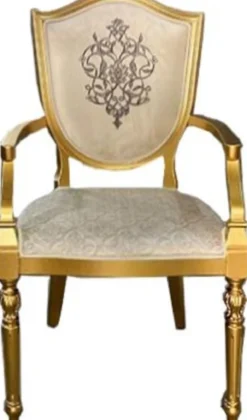 Casa Padrino Art Deco Esszimmerstuhl Cremefarben / Gold - Massivholz Stuhl mit Armlehnen und elegantem Muster - Art Deco Esszimmer Möbel