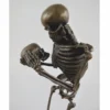 Casa Padrino Bronze Deko Skulptur Skelett H. 31 cm - Deko Accessoires