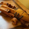 Casa Padrino Deko Auto Rennwagen Braun 31 x 14 x H. 9 cm - Handgefertigtes Holz Auto - Wohnzimmer Deko - Schreibtisch Deko - Deko Accessoires - Holz Autos