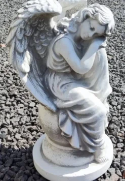 Casa Padrino Jugendstil Garten Deko Skulptur Engel auf Kugel Grau H. 39 cm - Elegante Garten Deko Stein Figur - Barock & Jugendstil Garten Deko Accessoires - Garten Deko Skulpturen