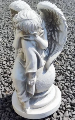 Casa Padrino Jugendstil Garten Deko Skulptur Engel auf Kugel Grau H. 39 cm - Elegante Garten Deko Stein Figur - Barock & Jugendstil Garten Deko Accessoires - Garten Deko Skulpturen