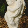 Casa Padrino Jugendstil Wasserspeier Skulptur Junge mit Fisch Sandfarben H. 48 cm - Elegante Wasserspeier Stein Figur - Barock & Jugendstil Garten Deko Accessoires