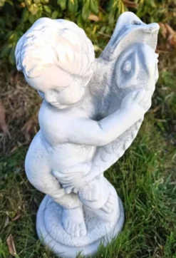 Casa Padrino Jugendstil Wasserspeier Skulptur Junge mit Fisch Grau H. 48 cm - Elegante Wasserspeier Stein Figur - Barock & Jugendstil Garten Deko Accessoires