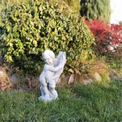 Casa Padrino Jugendstil Wasserspeier Skulptur Junge mit Fisch Grau H. 48 cm - Elegante Wasserspeier Stein Figur - Barock & Jugendstil Garten Deko Accessoires