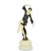 Casa Padrino Luxus Art Deco Bronzefigur Tänzerin Autumn Dancer Dunkelbraun / Elfenbein 13 x 16,7 x H. 41,3 cm - Kalt bemalte Bronze Skulptur - Tänzerin Deko Figur - Art Deco Deko
