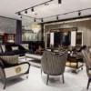 Casa Padrino Luxus Art Deco Couchtisch Schwarz / Cremefarben / Gold - Prunkvoller Massivholz Wohnzimmertisch - Luxus Art Deco Wohnzimmer Möbel