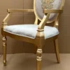 Casa Padrino Luxus Art Deco Esszimmer Stuhl Grau / Gold - Eleganter Massivholz Stuhl mit Armlehnen - Art Deco Esszimmer Möbel