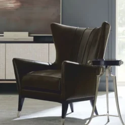 Casa Padrino Luxus Art Deco Leder Ohrensessel Braun / Schwarz / Silber H. 102 cm