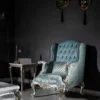 Casa Padrino Luxus Barock Ohrensessel Hellblau / Silber / Gold 77 x 80 x H. 113 cm - Wohnzimmer Sessel mit elegantem Muster und dekorativem Kissen - Barock Wohnzimmer Möbel