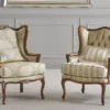 Casa Padrino Luxus Barock Ohrensessel Gold / Creme / Braun - Handgefertigter Barockstil Wohnzimmer Sessel mit Streifen - Luxus Wohnzimmer Möbel im Barockstil - Luxus Qualität - Made in Italy