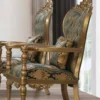 Casa Padrino Luxus Barock Sessel Grün / Gold - Prunkvoller Wohnzimmer Sessel mit elegantem Muster und dekorativem Kissen - Barock Wohnzimmer Möbel