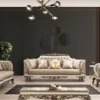 Casa Padrino Luxus Barock Sessel Beige / Cremefarben / Braun / Gold - Prunkvoller Wohnzimmer Sessel mit elegantem Muster - Barock Wohnzimmer Möbel