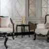 Casa Padrino Luxus Barock Wohnzimmer Sessel Creme / Schwarz / Gold - Handgefertigter Barockstil Sessel mit dekorativem Kissen - Luxus Wohnzimmer Möbel im Barockstil - Barock Möbel