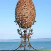 Casa Padrino Luxus Barock XXL Stahl Garten Skulptur Ei Rost / Silber 107 x 95 x H. 200 cm - Riesige XXL Garten Deko - Luxus Outdoor Deko - Luxus Garten Deko Accessoires