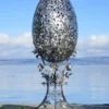 Casa Padrino Luxus Barock XXL Edelstahl Garten Skulptur Ei Silber 107 x 95 x H. 200 cm - Riesige XXL Garten Deko - Luxus Outdoor Deko - Luxus Garten Deko Accessoires