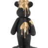 Casa Padrino Luxus Beistelltisch Bär Schwarz / Gold Ø 48,5 x H. 69 cm - Runder Kunstharz Tisch mit Glasplatte - Wohnzimmer Möbel - Luxus Möbel - Luxus Einrichtung - Wohnzimmer Einrichtung