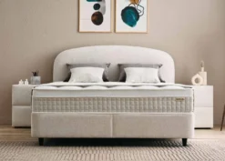 Casa Padrino Luxus Boxspringbett mit geschwungenem Kopfteil Creme 180 x 200 cm - Luxus Schlafzimmer Möbel
