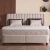 Casa Padrino Luxus Boxspringbett mit Ohrenkopfteil Beige 140 x 200 cm - Luxus Schlafzimmer Möbel