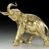 Casa Padrino Luxus Bronze Deko Skulptur Elefant Gold 27 x H. 24 cm - Schreibtisch Deko