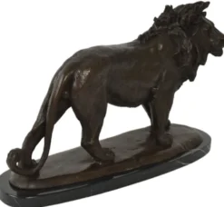Casa Padrino Luxus Bronze Skulptur Löwe Bronzefarben / Schwarz 49 x 16 x H. 31 cm - Bronzefigur mit Marmorsockel - Dekofigur - Deko Accessoires - Luxus Kollektion