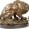 Casa Padrino Luxus Bronze Skulptur Löwe mit Schlange auf Marmorsockel Bronze / Gold / Schwarz 41 x H. 35 cm - Luxus Bronzefigur