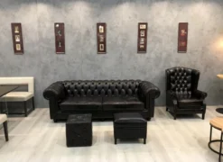 Casa Padrino Luxus Chesterfield Leder Ohrensessel Schwarz - Chesterfield Echtleder Wohnzimmer Sessel - Wohnzimmer Möbel - Chesterfield Möbel - Echtleder Möbel - Luxus Möbel - Luxus Einrichtung
