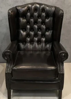 Casa Padrino Luxus Chesterfield Leder Ohrensessel Schwarz - Chesterfield Echtleder Wohnzimmer Sessel - Wohnzimmer Möbel - Chesterfield Möbel - Echtleder Möbel - Luxus Möbel - Luxus Einrichtung