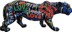 Casa Padrino Luxus Deko Skulptur Panther Schwarz / Bunt 80 x H. 35 cm - Große Deko Figur - XXL Deko Skulptur - XXL Deko Figur - Wohnzimmer Deko - Garten Deko - Luxus Figuren