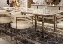Casa Padrino Luxus Esszimmer Set Creme / Weiß / Kupfer - 1 Luxus Esstisch mit Kunstmarmor Tischplatte & 8 Luxus Esszimmer Stühle - Esszimmer Möbel - Luxus Möbel - Luxus Einrichtung