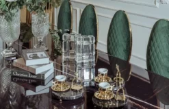 Casa Padrino Luxus Esszimmer Set Schwarz / Grün / Gold - 1 Luxus Esstisch & 10 Luxus Esszimmerstühle - Esszimmer Möbel - Luxus Qualität