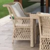 Casa Padrino Luxus Gartenstuhl 6er Set Naturfarben / Weiß 57 x 61 x H. 80 cm - Rattan Stühle mit Armlehnen und Kissen - Moderne Rattan Garten & Terrassen Möbel