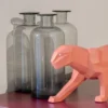 Casa Padrino Luxus Porzellan Panther Skulptur Matt Korallenrot 50 x 12 x H. 19 cm - Hangefertigte Deko Figur aus feinstem spanischen Porzellan - Luxus Deko Accessoires