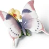 Casa Padrino Luxus Porzellan Schmetterlingsfigur Skulptur auf Blume mehrfarbig 11 x H. 6 cm