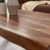 Casa Padrino Massivholz Couchtisch mit Metallbeinen Braun / Schwarz 110 x 60 x H. 40 cm - Rechteckiger Wohnzimmertisch im Industrie Look - Wohnzimmer Möbel