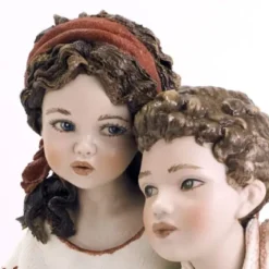 Casa Padrino Porzellan Deko Puppen Skulptur Junge & Mädchen H. 22,5 cm - Made in Italy