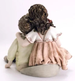 Casa Padrino Porzellan Deko Puppen Skulptur Junge & Mädchen H. 22,5 cm - Made in Italy