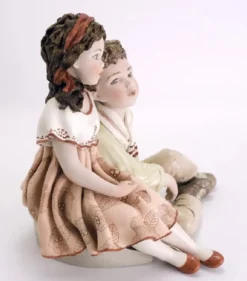 Casa Padrino Porzellan Deko Puppen Skulptur Junge & Mädchen H. 22,5 cm - Made in Italy