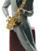 Casa Padrino Porzellan Skulptur Jazz Saxophonist, mehrfarbig, 23 x H. 29 cm - Handgefertigte & Handbemalte Luxus Deko Figur