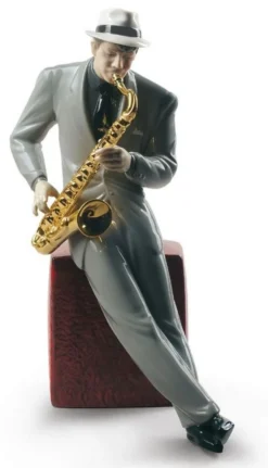 Casa Padrino Porzellan Skulptur Jazz Saxophonist, mehrfarbig, 23 x H. 29 cm - Handgefertigte & Handbemalte Luxus Deko Figur