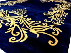 Pompöös by Casa Padrino Luxus Teppich von Harald Glööckler 160 x 230 cm Krone Royalblau / Gold - Barock Design Teppich - Handgewebt aus Wolle